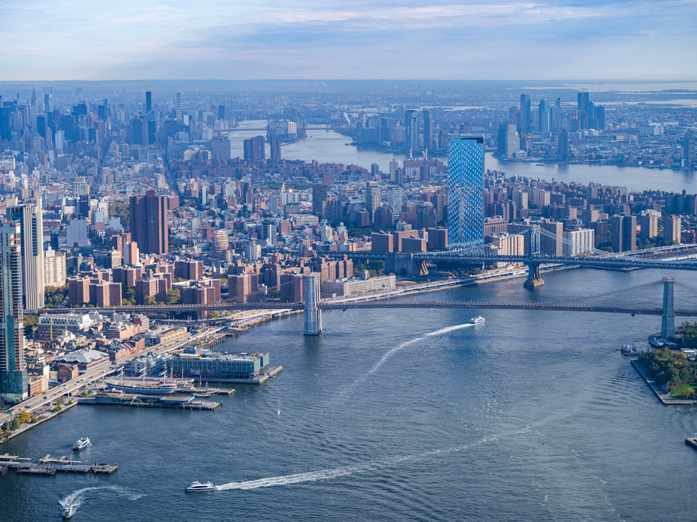 an aerial view of a city and a bridge