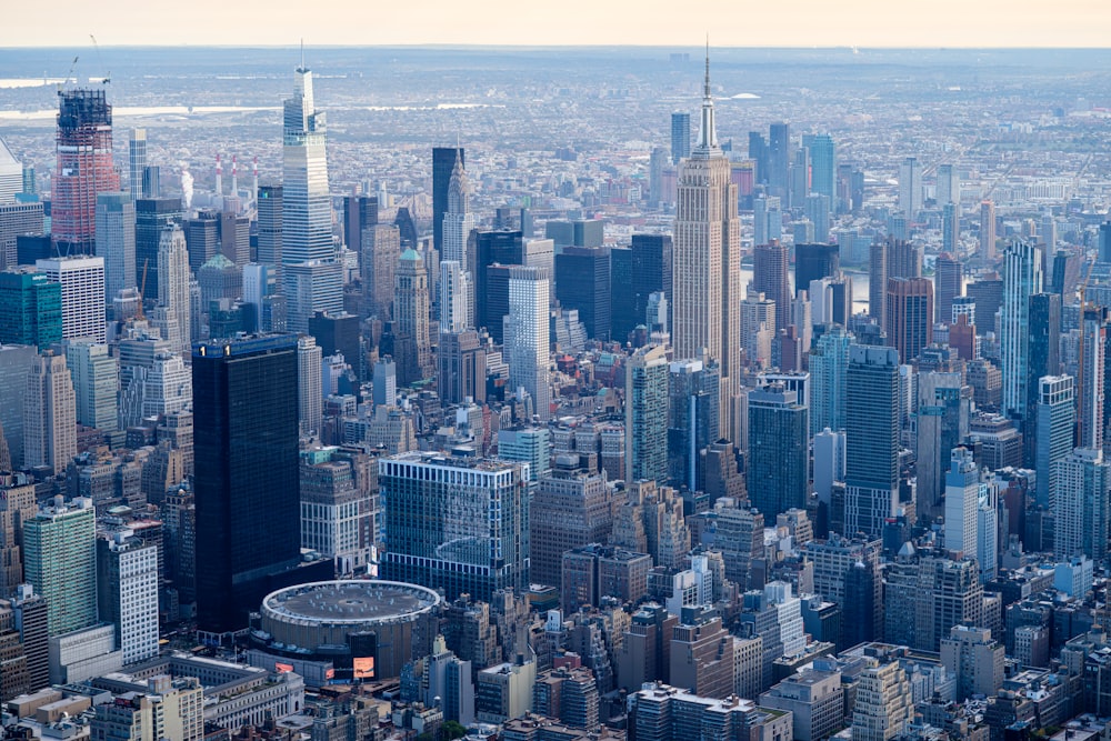 an aerial view of a city with tall buildings