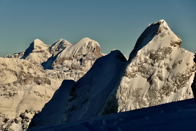 A stunning view of the Swiss Alps under a clear sky.