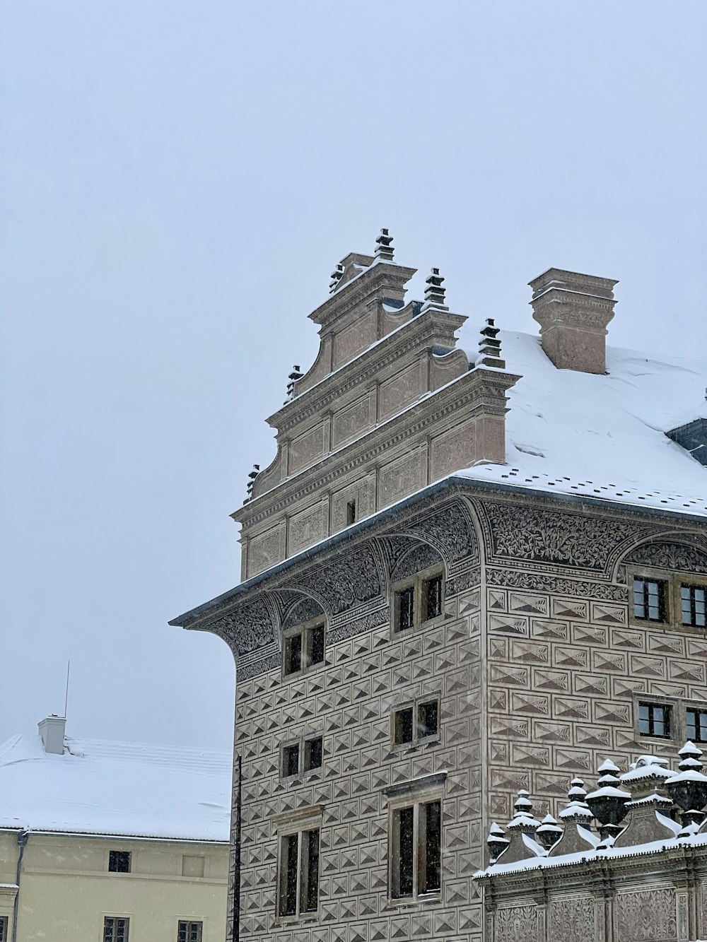 a tall building with a clock on the top of it