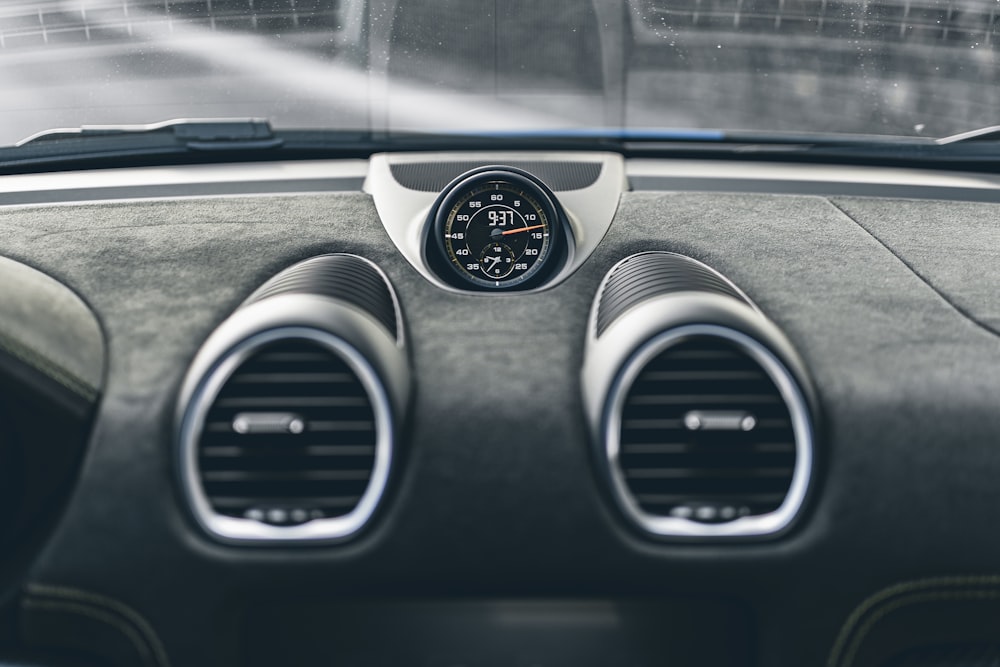 the dashboard of a car with a speedometer