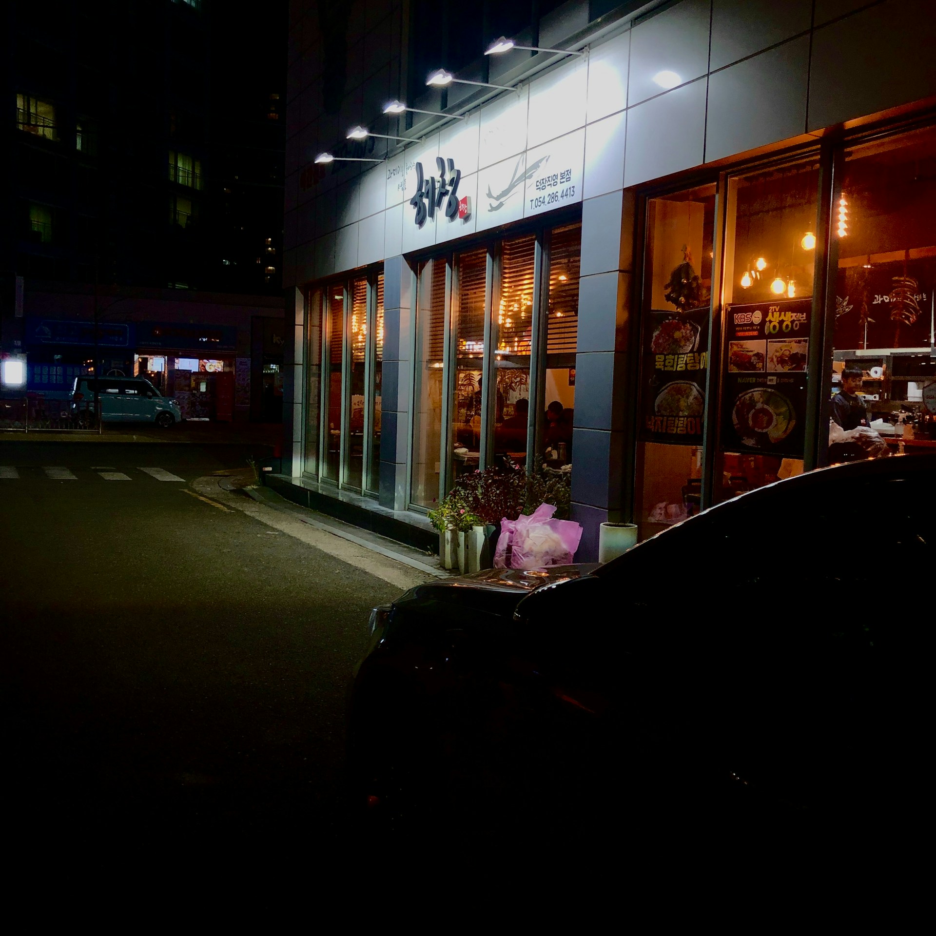 woman wearing yellow long-sleeved dress under white clouds and blue sky during daytime