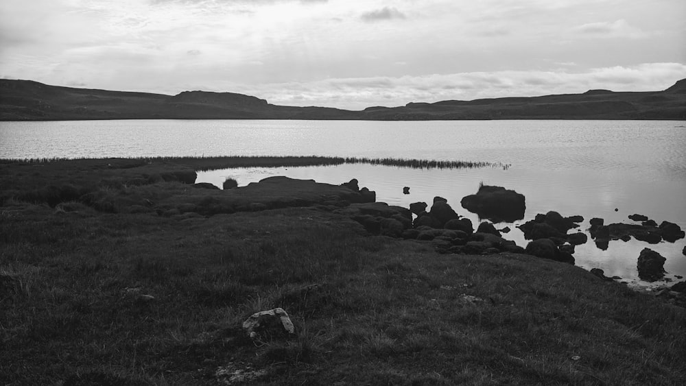 a black and white photo of a body of water