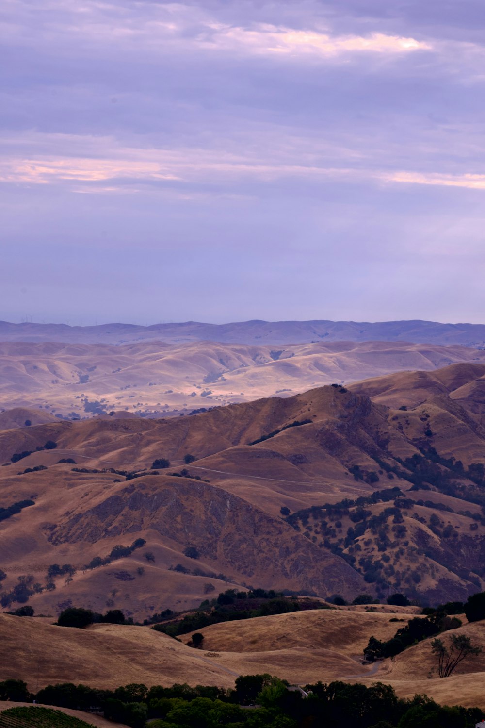 a view of a mountain range from a distance