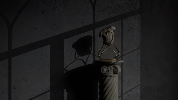 A textured wall serves as the backdrop for a stone pedestal holding an anatomically detailed heart sculpture made of stone or similar material. The heart is enclosed in a delicate, gold-colored metal frame. Shadows of a window grille are cast on the wall, creating a dramatic play of light and dark.