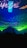 A vibrant display of green laser lights creates a dynamic visual spectacle against a dark background. The silhouette of a person's hand is raised in the foreground, contributing to the vibrant atmosphere of a live performance or event. Bright colors and motion dominate the scene, capturing the essence of an energetic night out.