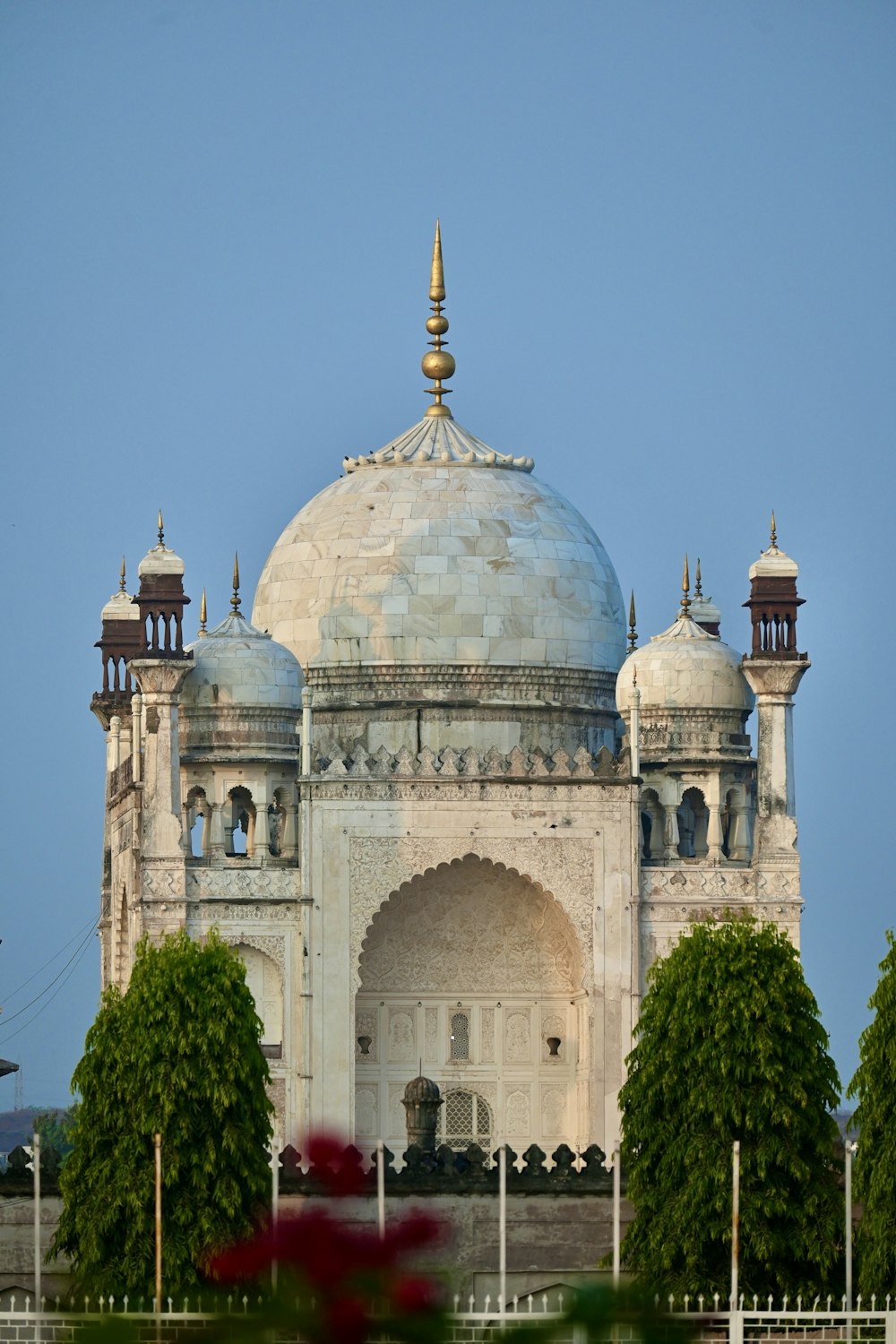 a large white building with a dome on top of it