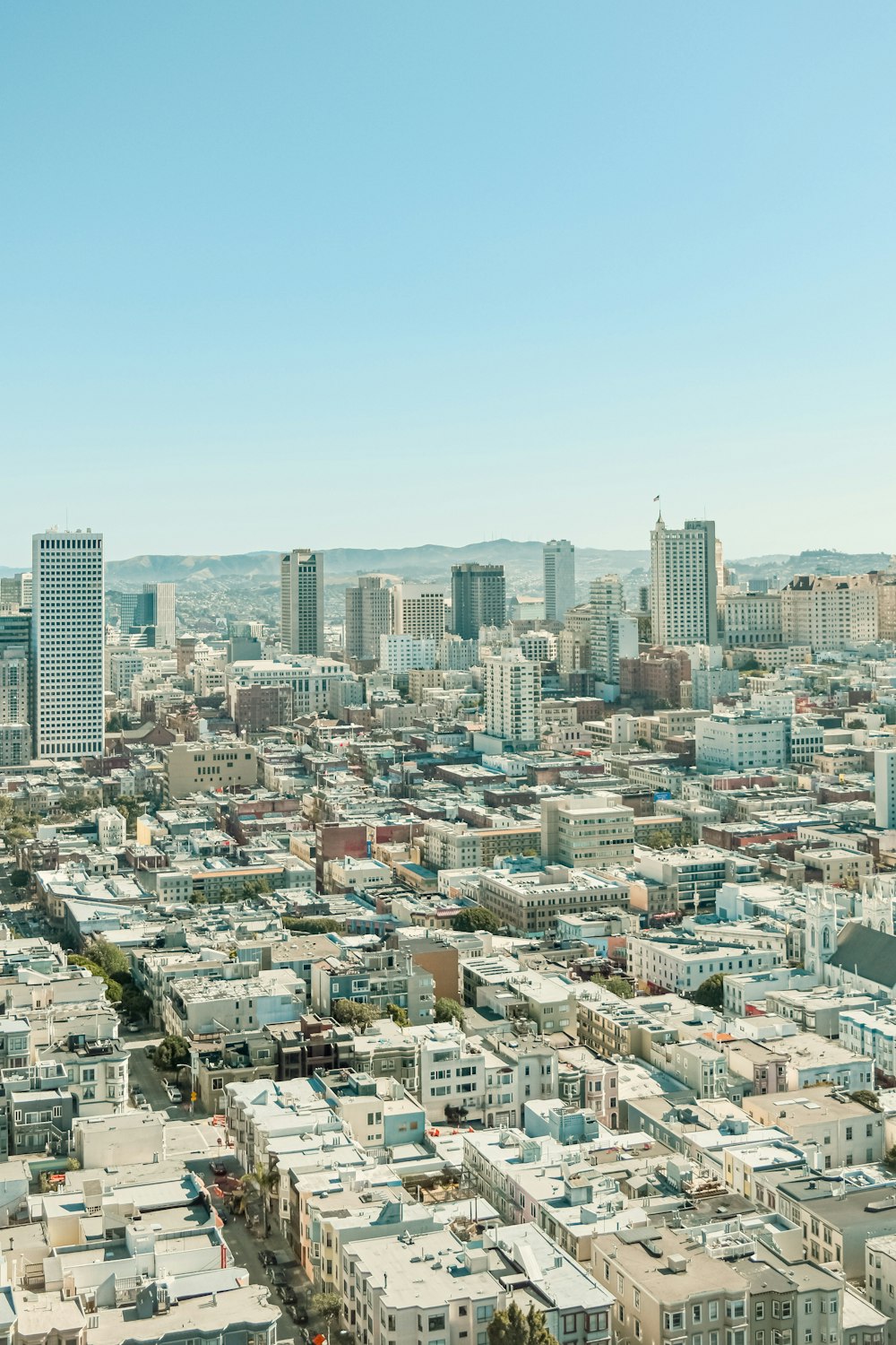 a view of a city from the top of a building