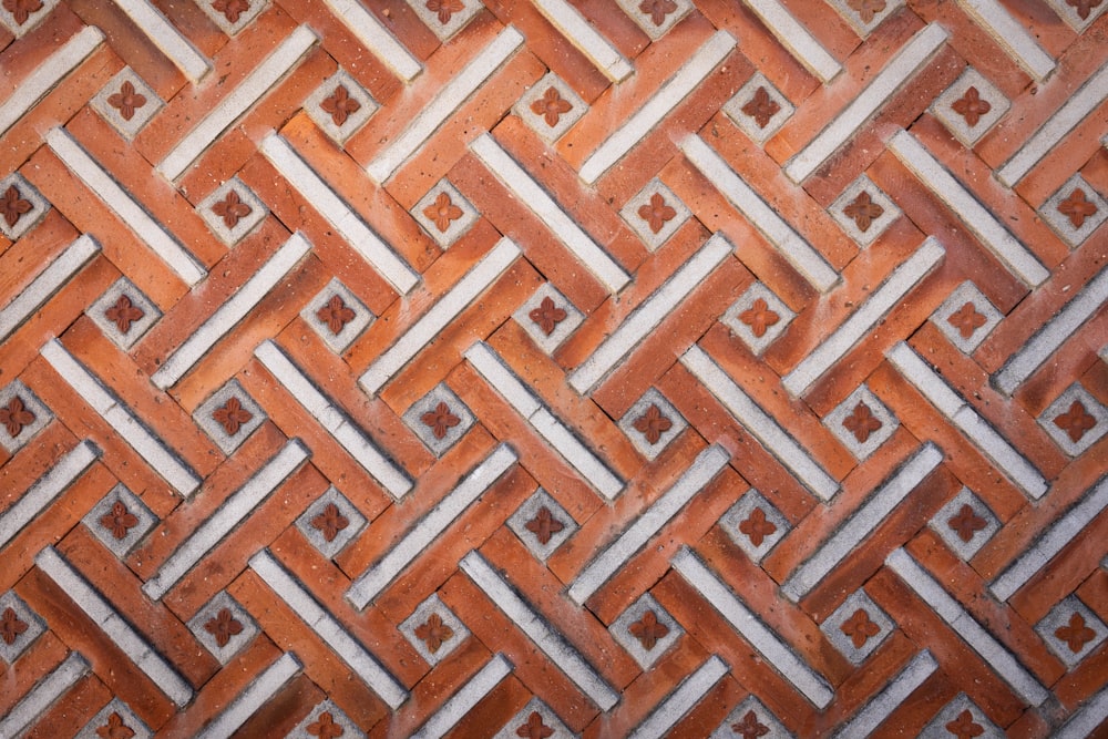 a close up of a wooden floor with a pattern on it