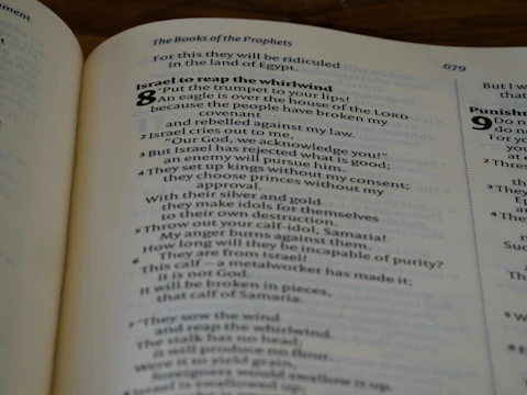 a close up of an open book on a table