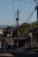 Modern residential houses with underground utilities visible.