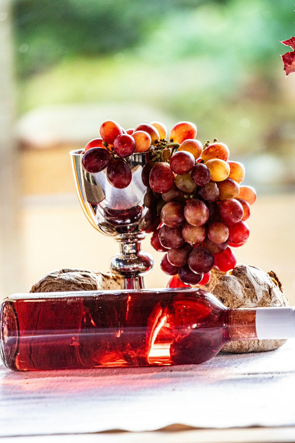 a bunch of grapes sitting on top of a table