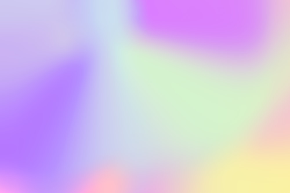a blurry image of a purple and yellow background