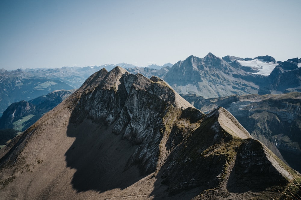 a view of a mountain range from the top of a mountain