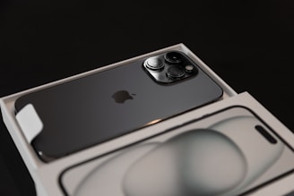 an iphone in a box on a black background