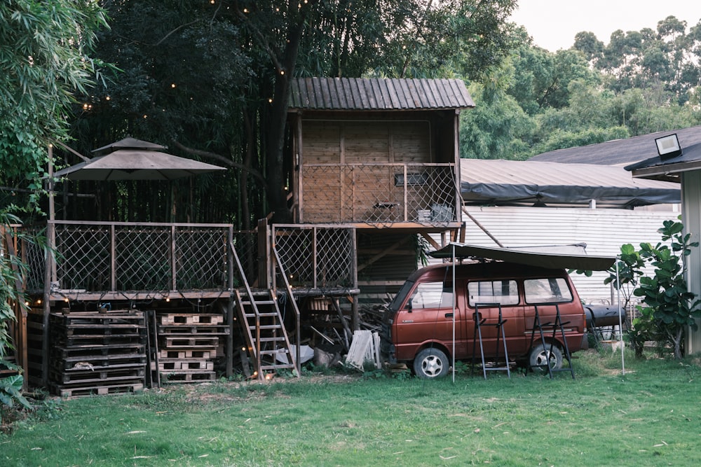 a van is parked in front of a house