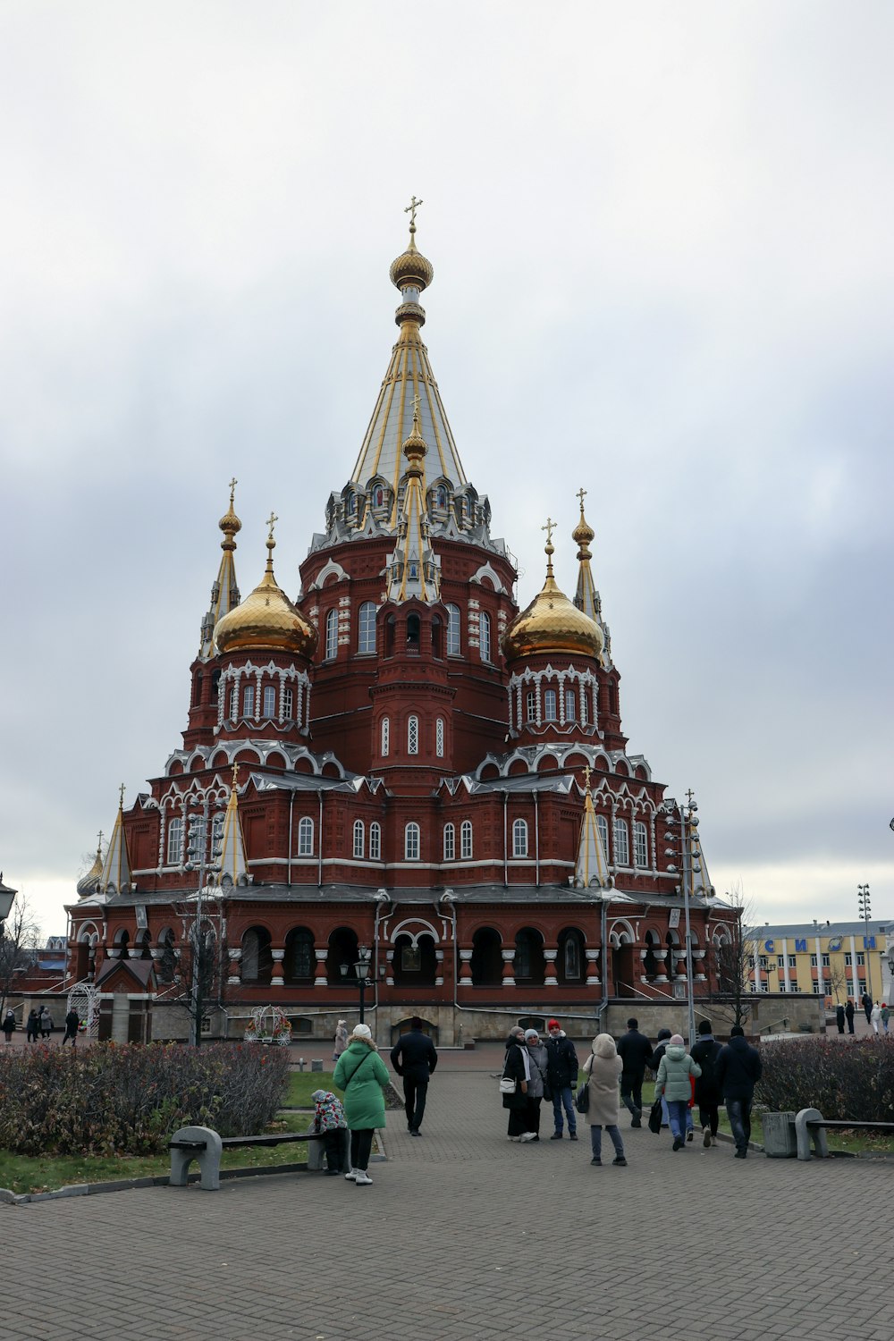 a group of people standing in front of a building