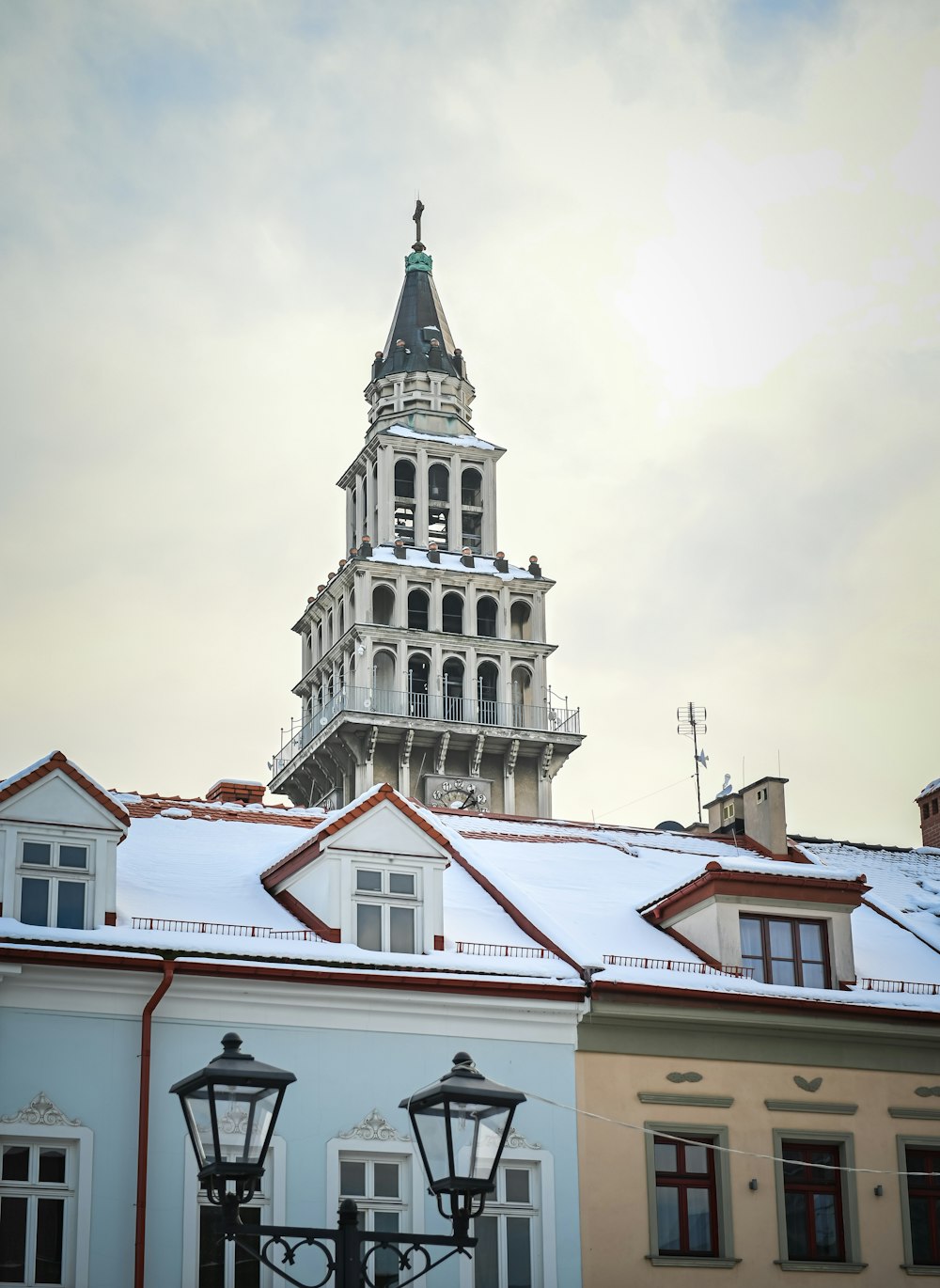 a tall building with a clock on the top of it