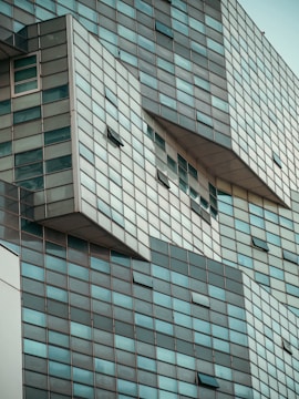 Commercial building facade with glass windows.