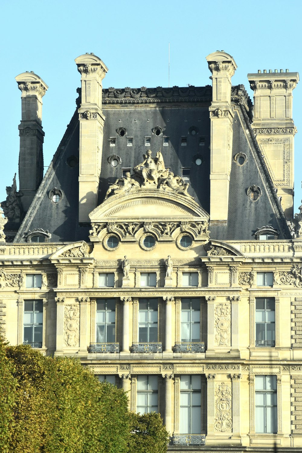 a large building with a clock on the front of it