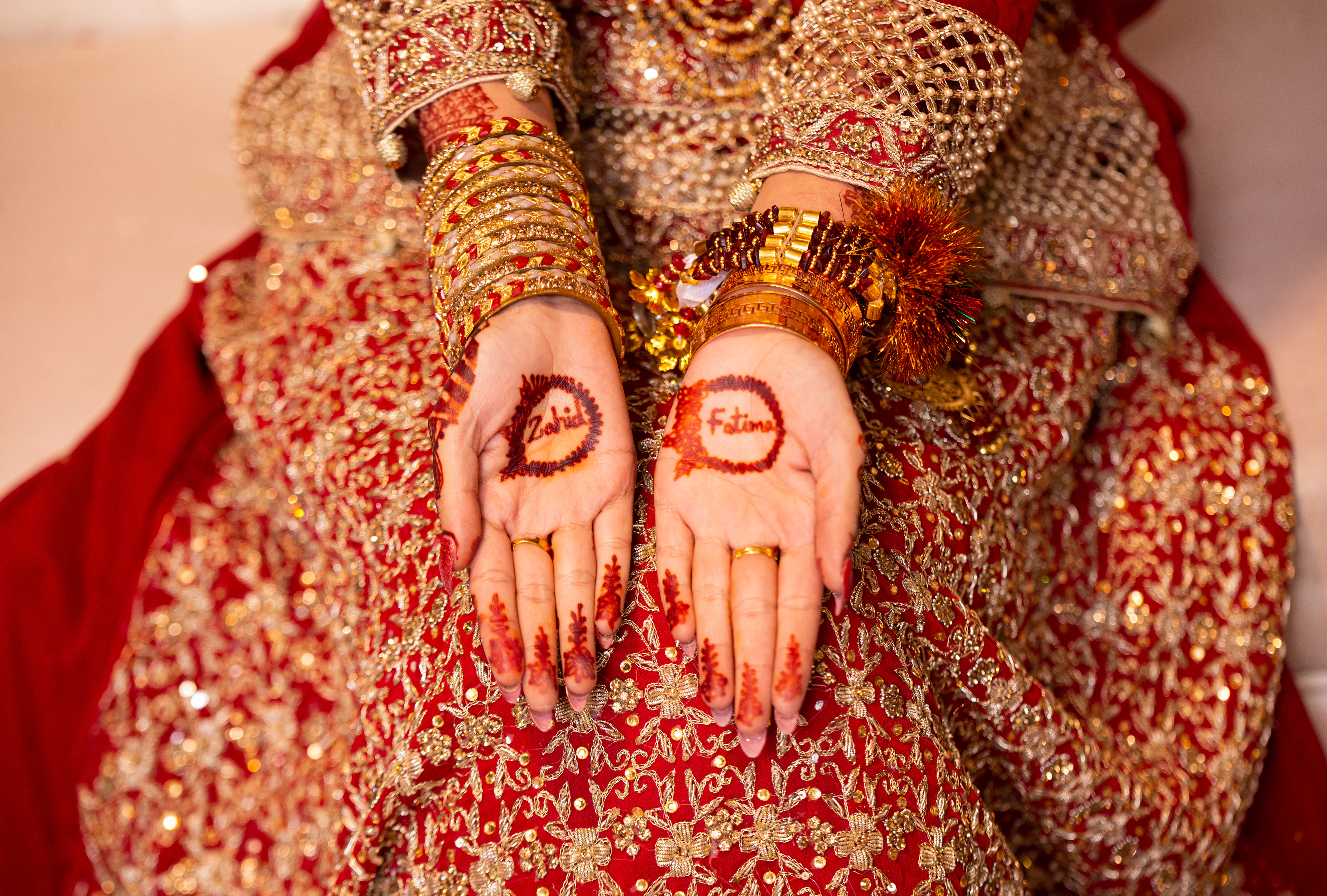 Full bridal mehndi covering a bride's hands, wrists and forearms in Bangalore