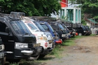 A variety of vehicles lined up for service.
