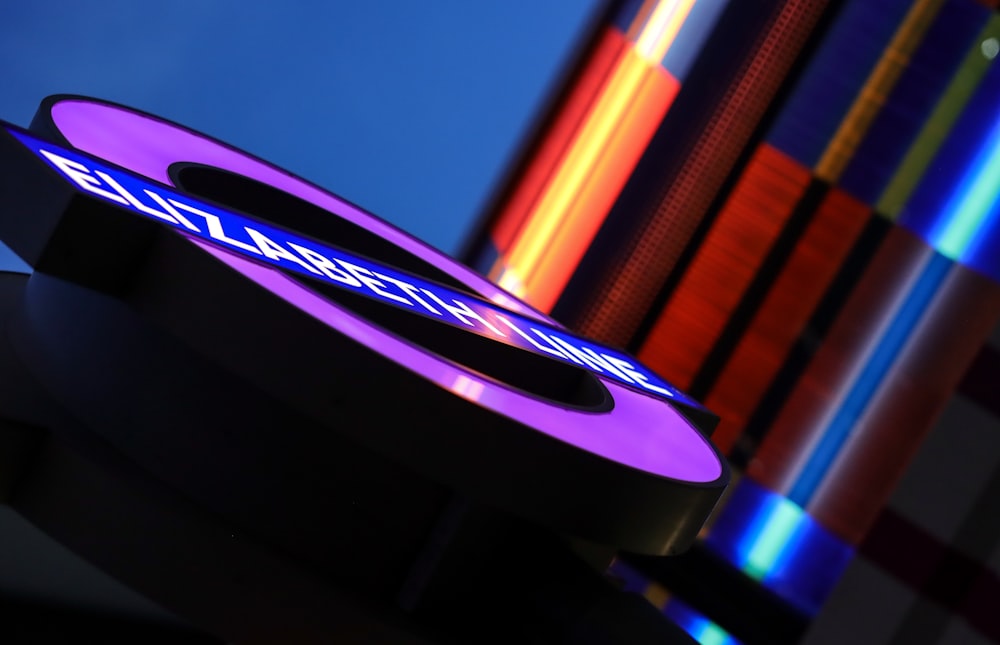 a close up of a purple frisbee on a table