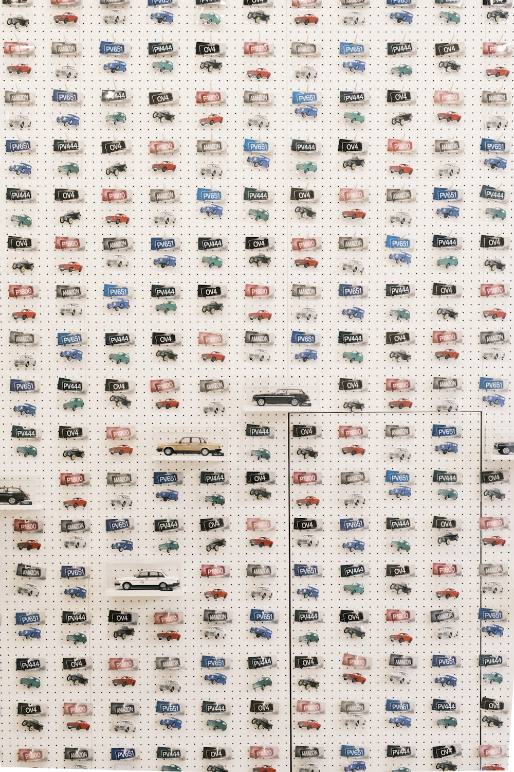 a wall with a bunch of cars on it