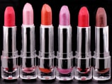 An array of colorful lipsticks in a stylish layout.