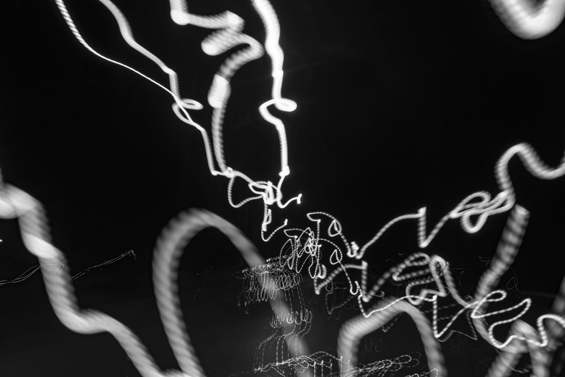 a black and white photo of some lights