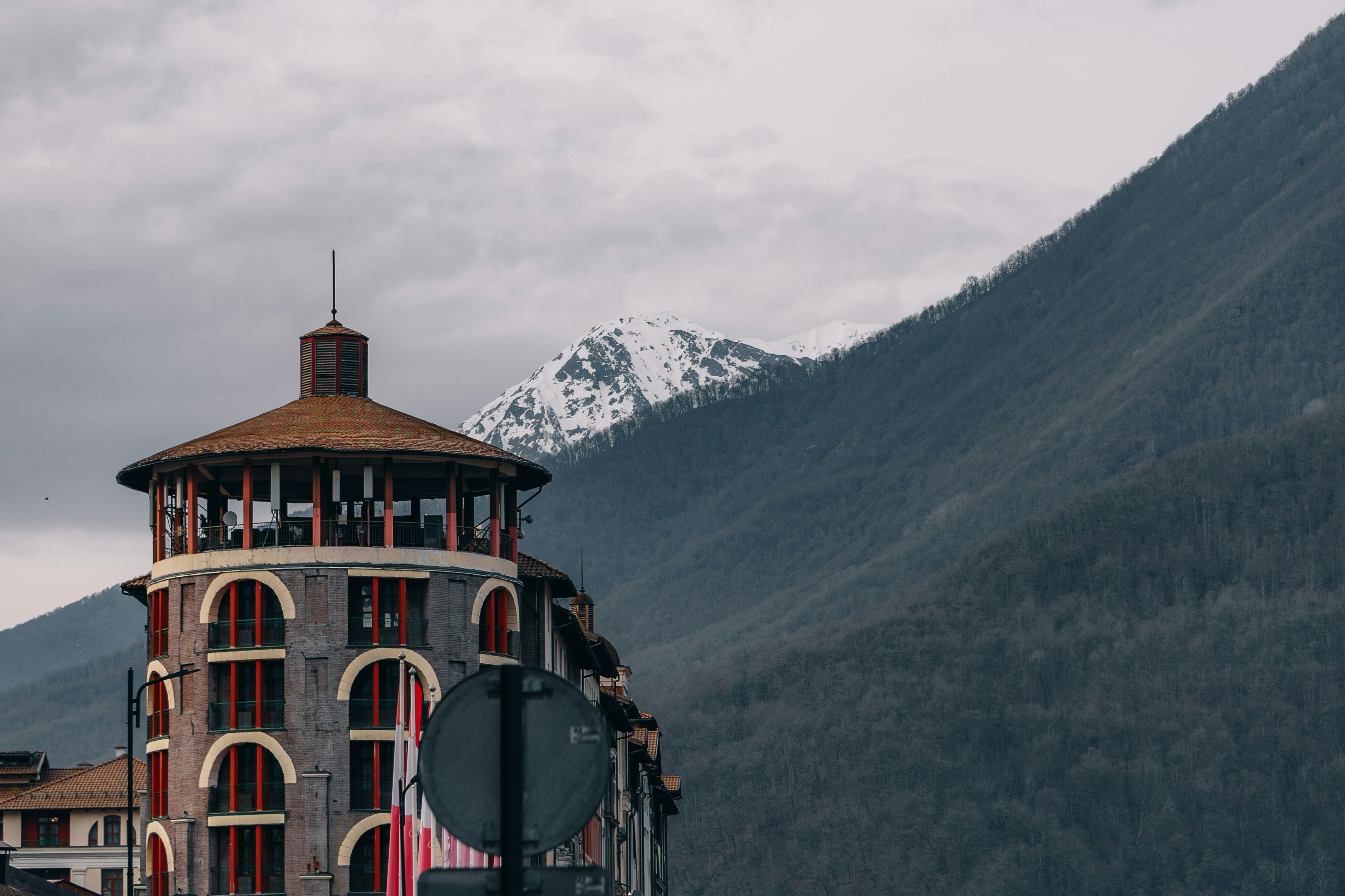 a tall building with a clock on the front of it