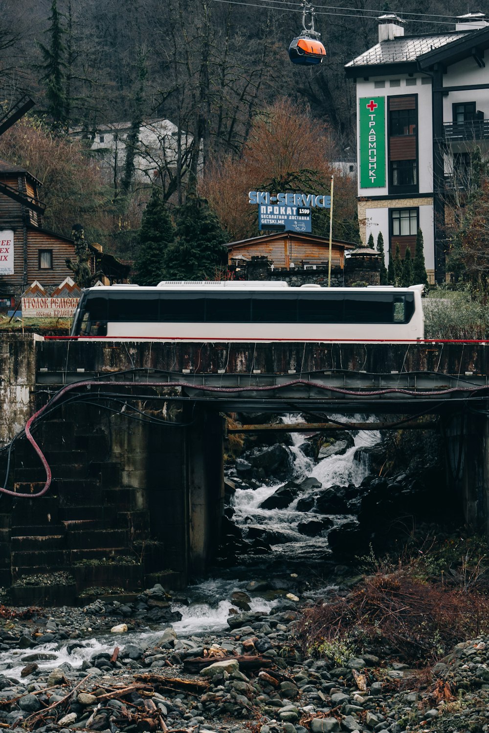 a train crossing a bridge over a river