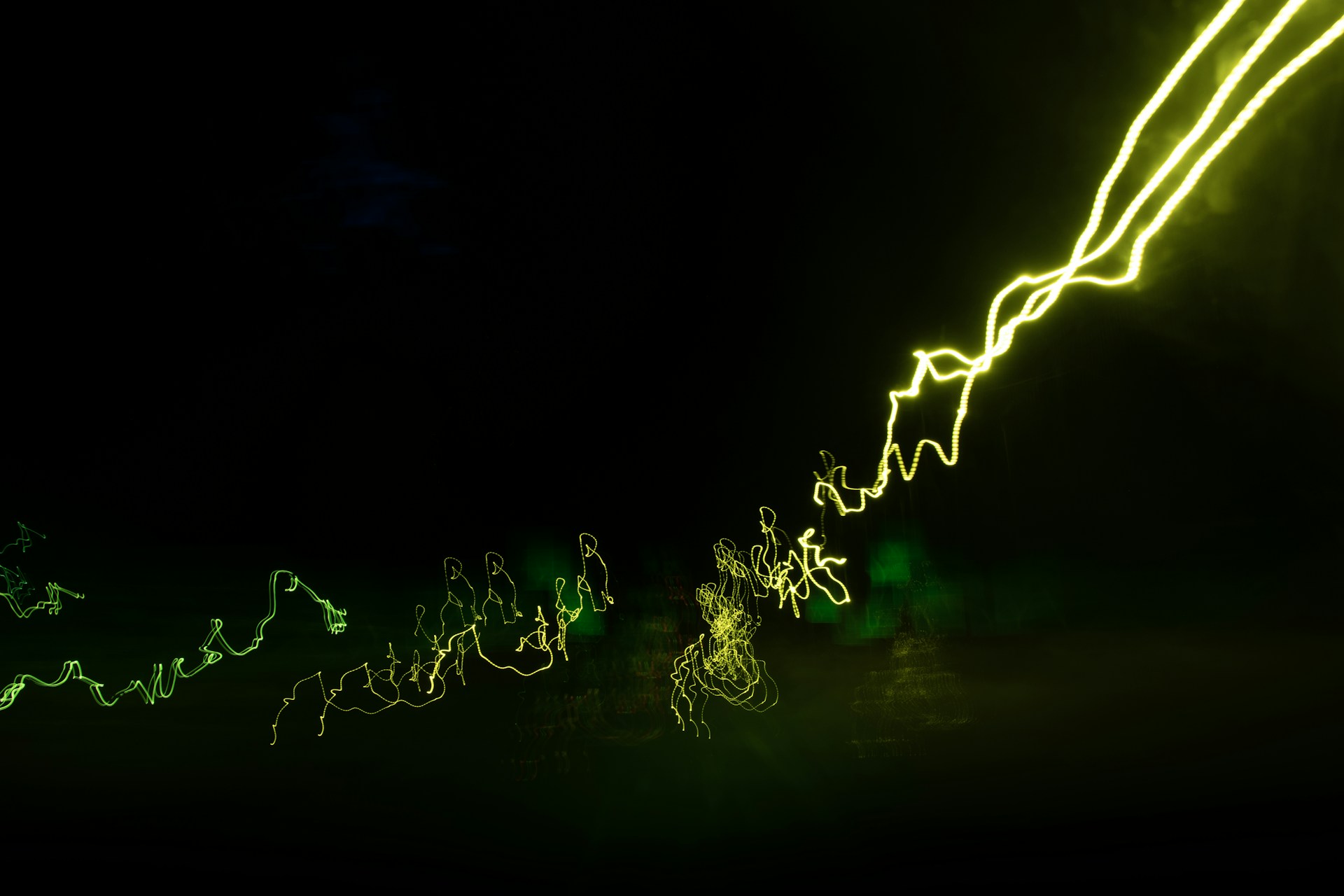 woman wearing yellow long-sleeved dress under white clouds and blue sky during daytime