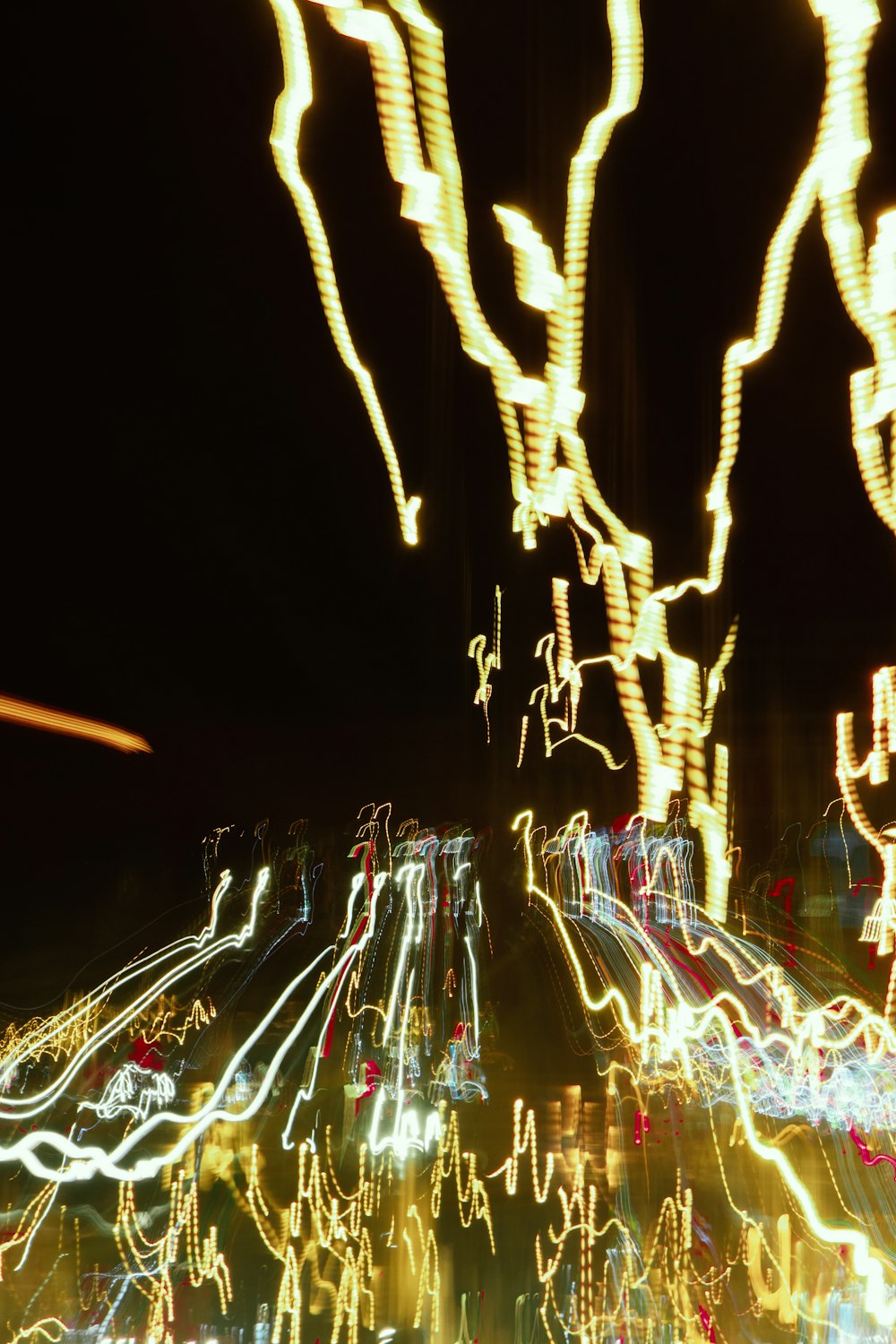 a blurry photo of a city street at night