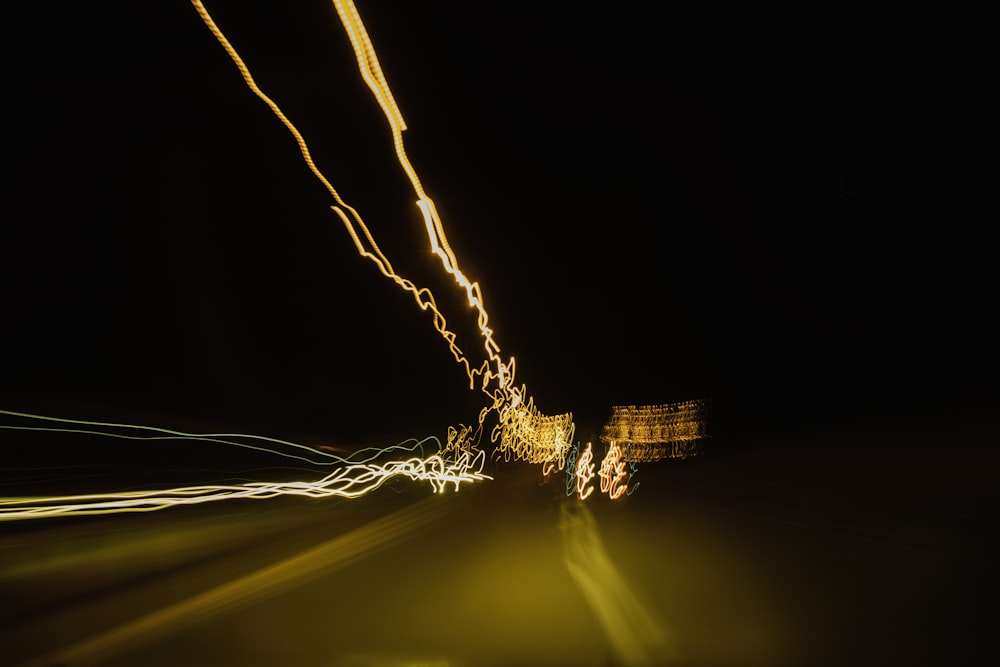 a blurry photo of a city street at night