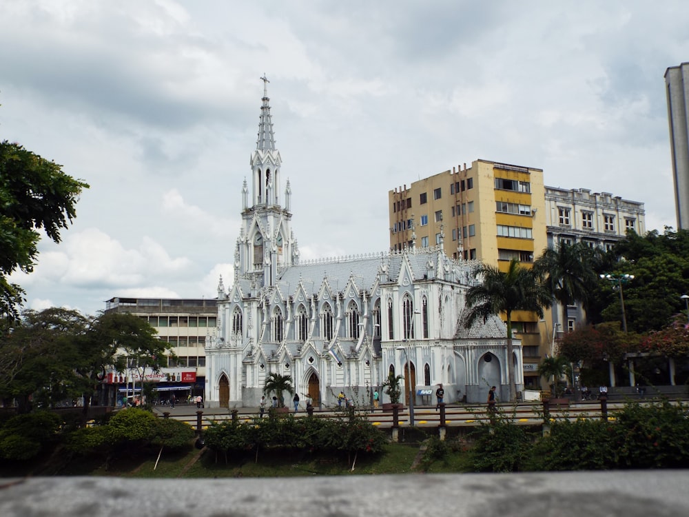 a large white building with a tall tower