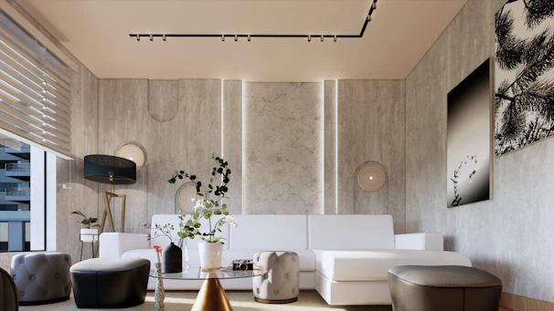 A sleek living room featuring taupe walls, minimalist furniture, and subtle gold accents.