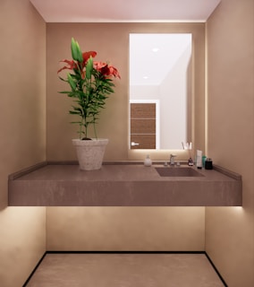 A modern bathroom brush with ergonomic grip standing next to a clean sink and mirror.