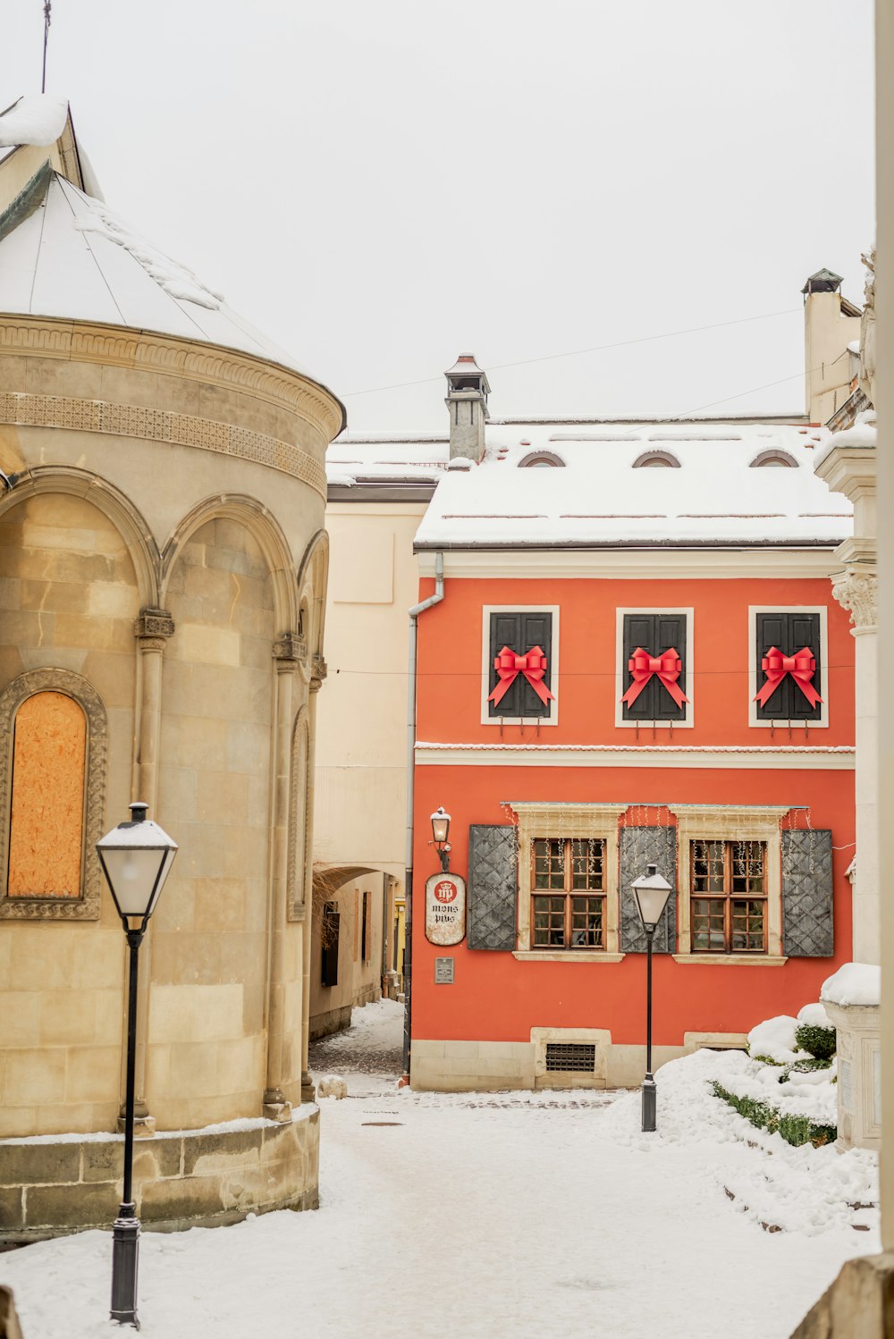 a red building with a red bow on it