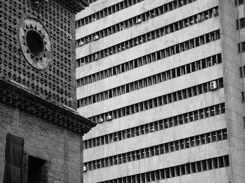 An archival photo juxtaposed with its modern-day restored counterpart, highlighting the transformation over decades.