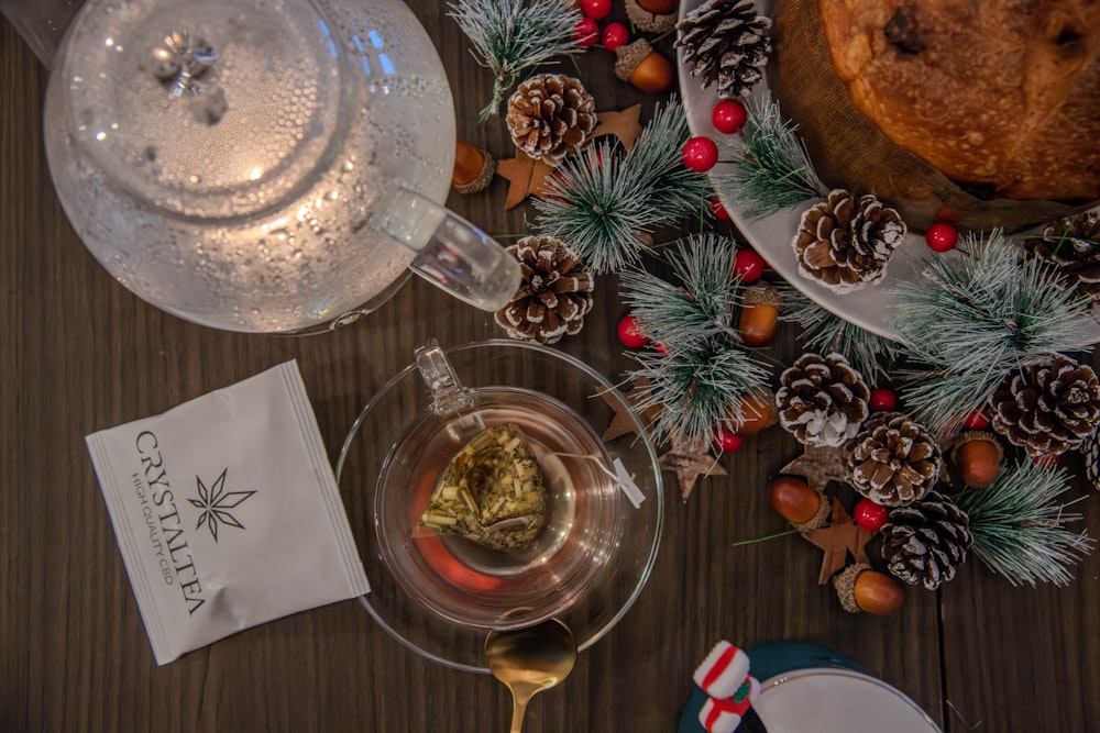 a table topped with wine glasses and plates of food