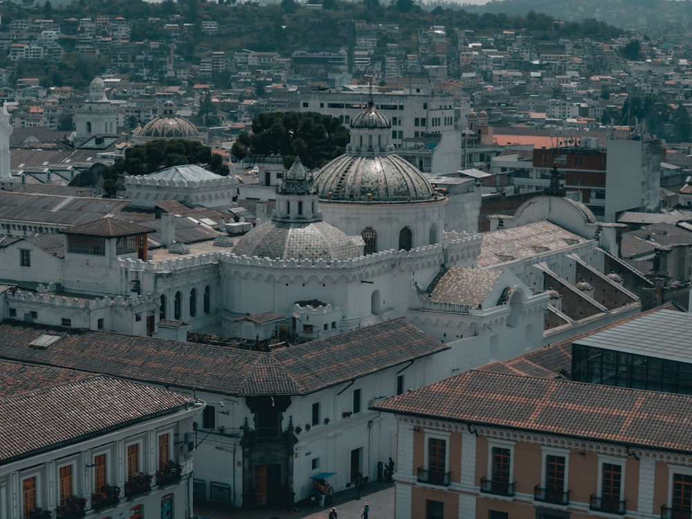 a large white building with a dome on top of it