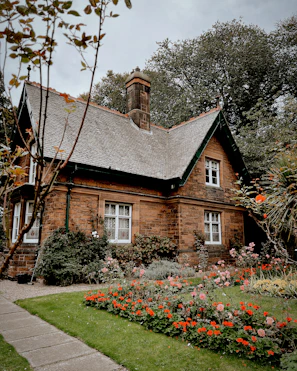Cozy countryside cottage with a blooming garden in the UK.