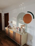 Elegant dining room sideboard showcasing fine wood grain and craftsmanship.