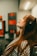 A person enjoying music through headphones, immersed in a vibrant atmosphere.