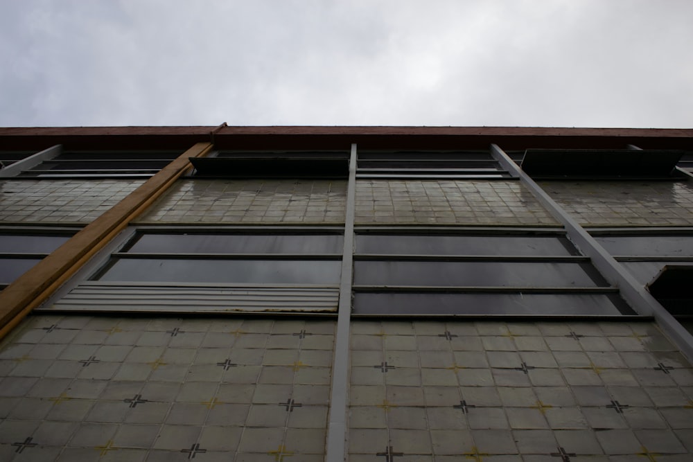 a tall building with a sky background