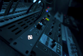 Close-up of premium audiovisual equipment with cinematic lighting and minimalist design.