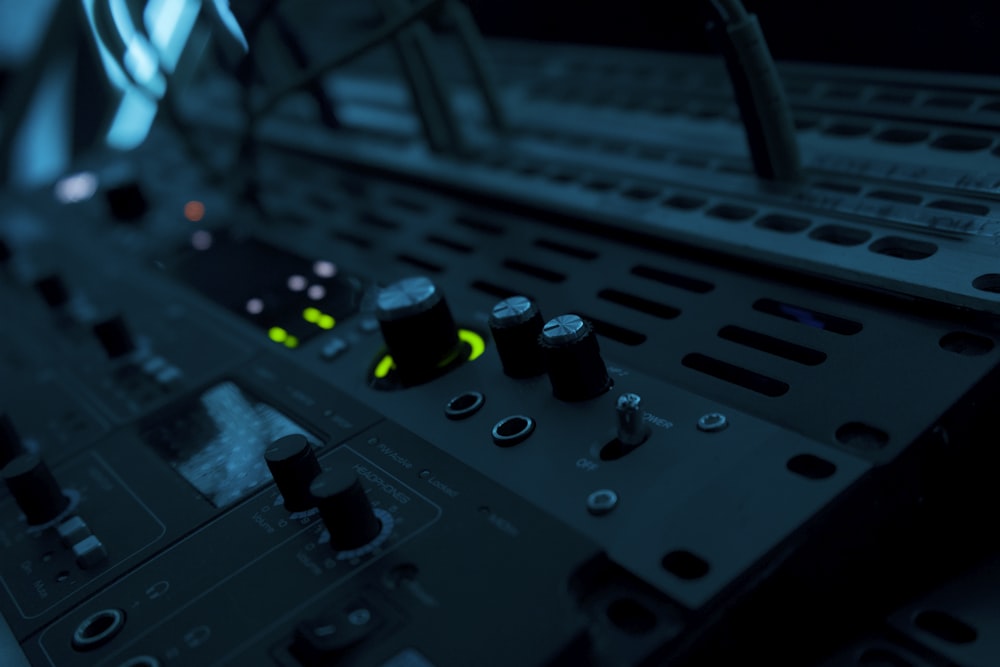 a close up of a control panel in a recording studio