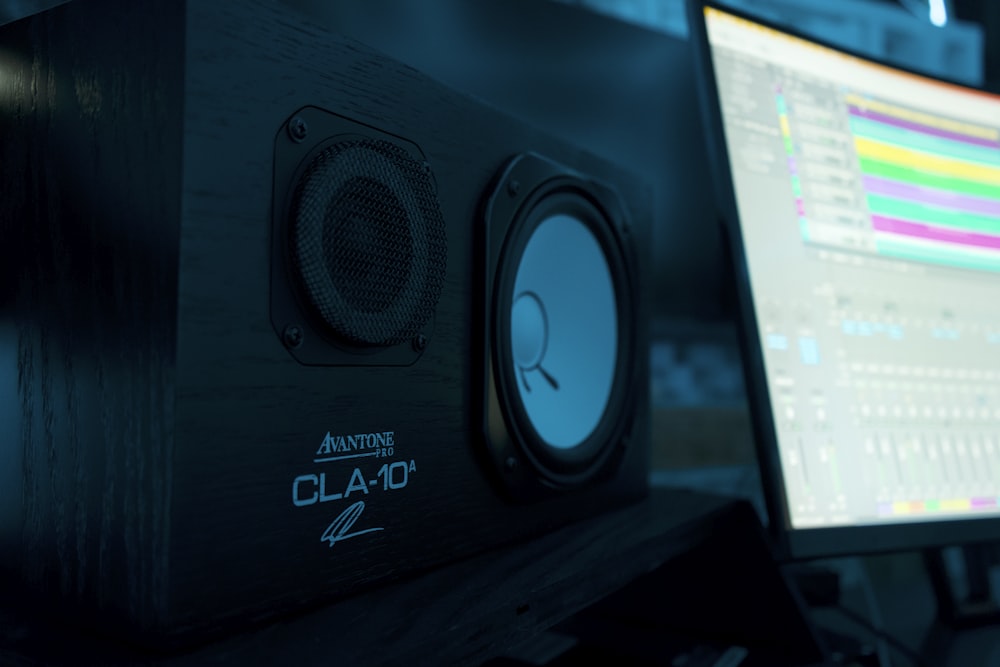 a computer monitor sitting on top of a desk