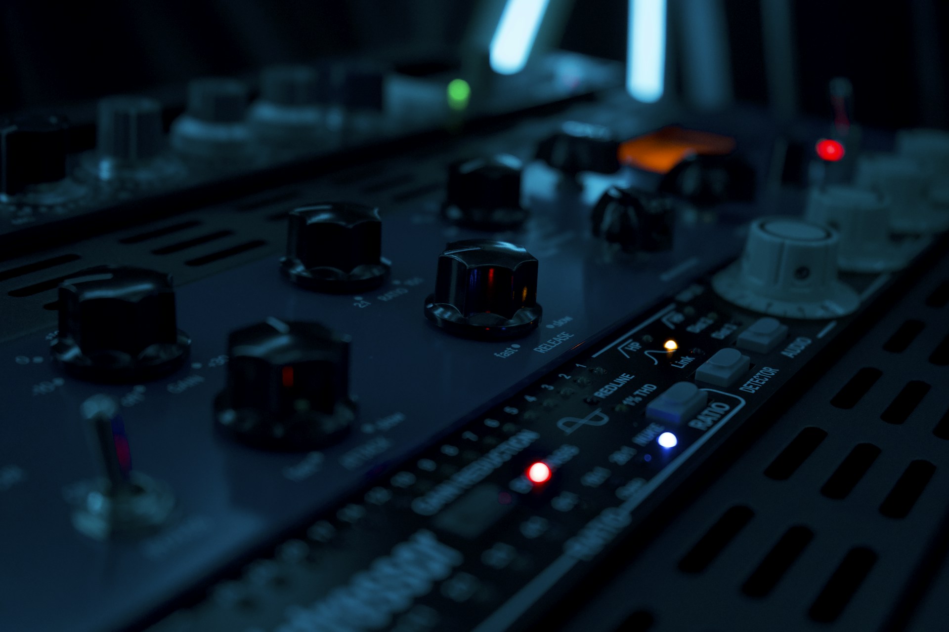 a close up of a mixing board with buttons